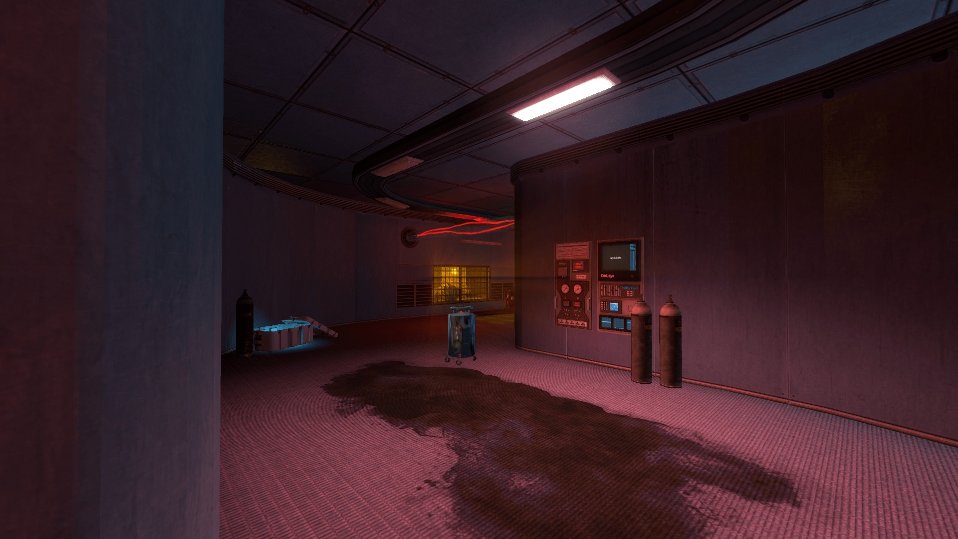 A dark laboratory corridor lit by emergency lights